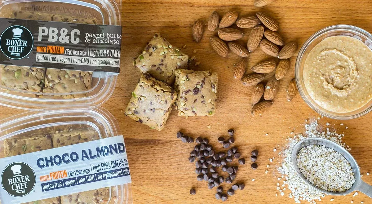 Boxer Chef protein squares styled with almonds and nut butter