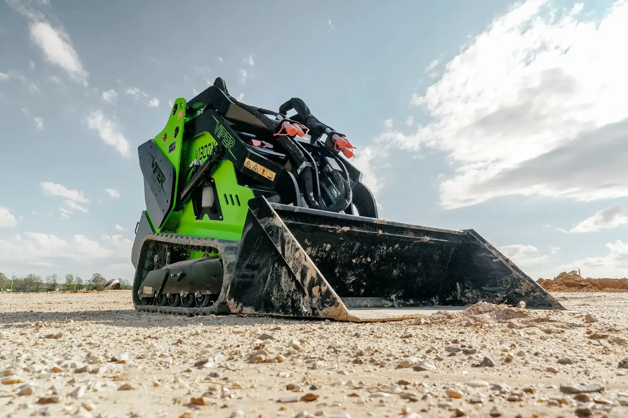 A Viper mini track loader on a gravel job site