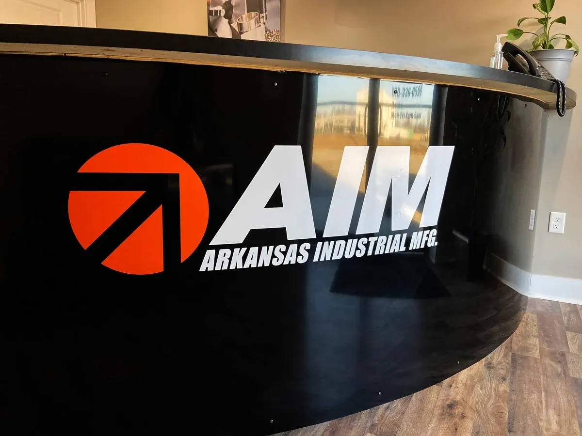 The AIM logo installed in the lobby