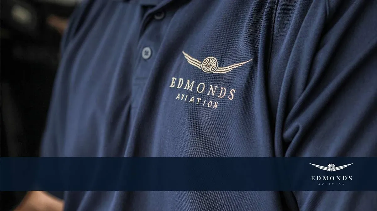 Edmonds Aviation branding on team uniforms